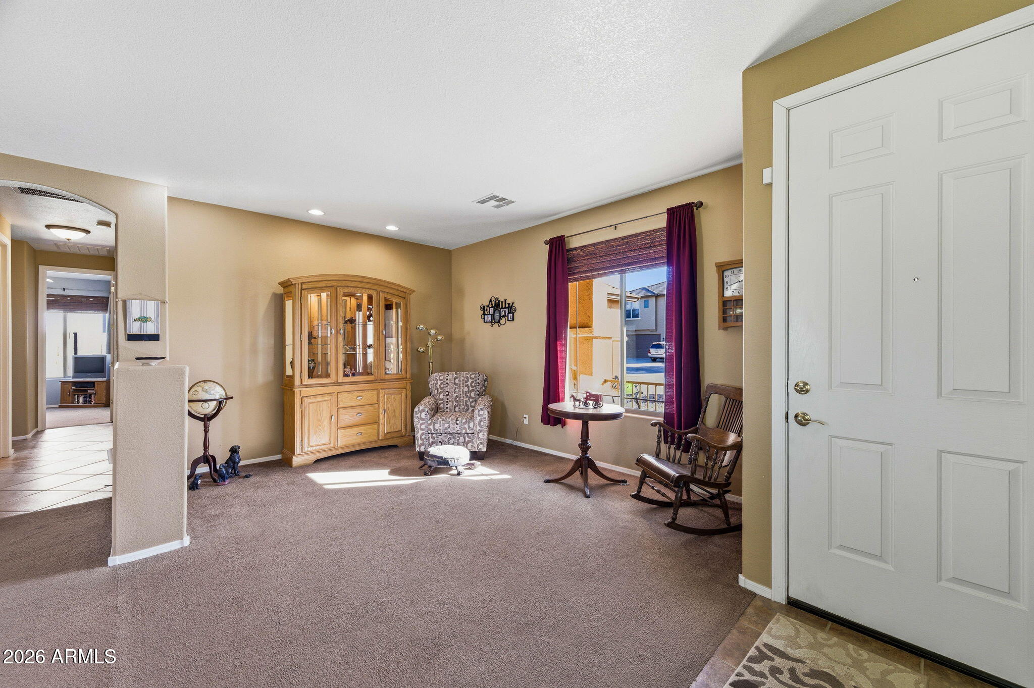 45558 West Mountain View Road Maricopa, AZ 85139 - Photo 12 of 33 a view of a room with furniture and windows