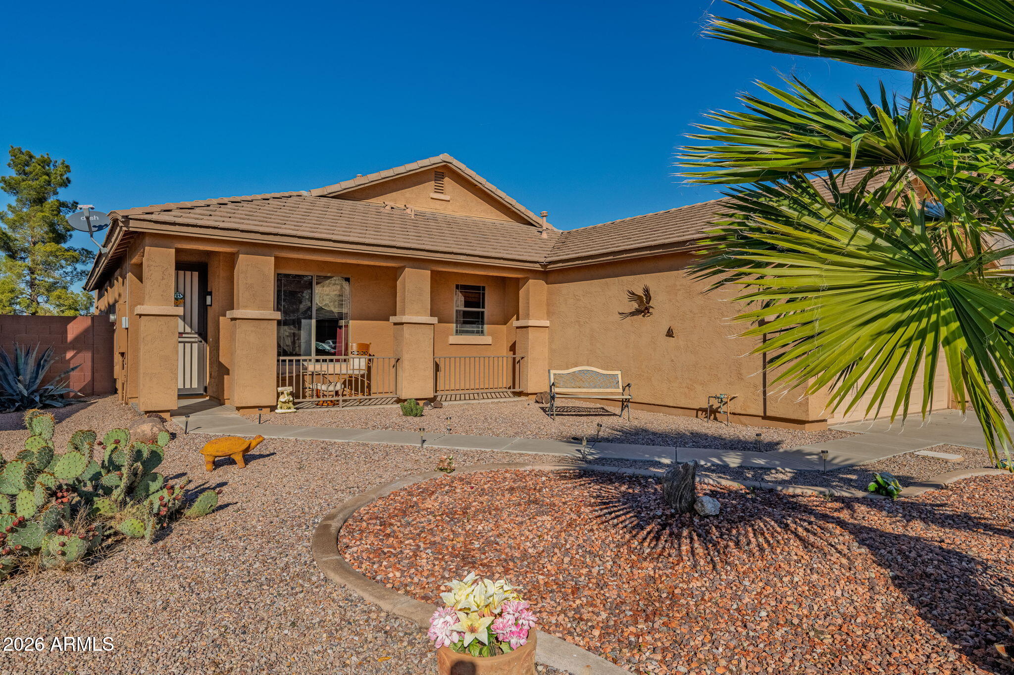 45558 West Mountain View Road Maricopa, AZ 85139 - Photo 2 of 33 a front view of a house with balcony