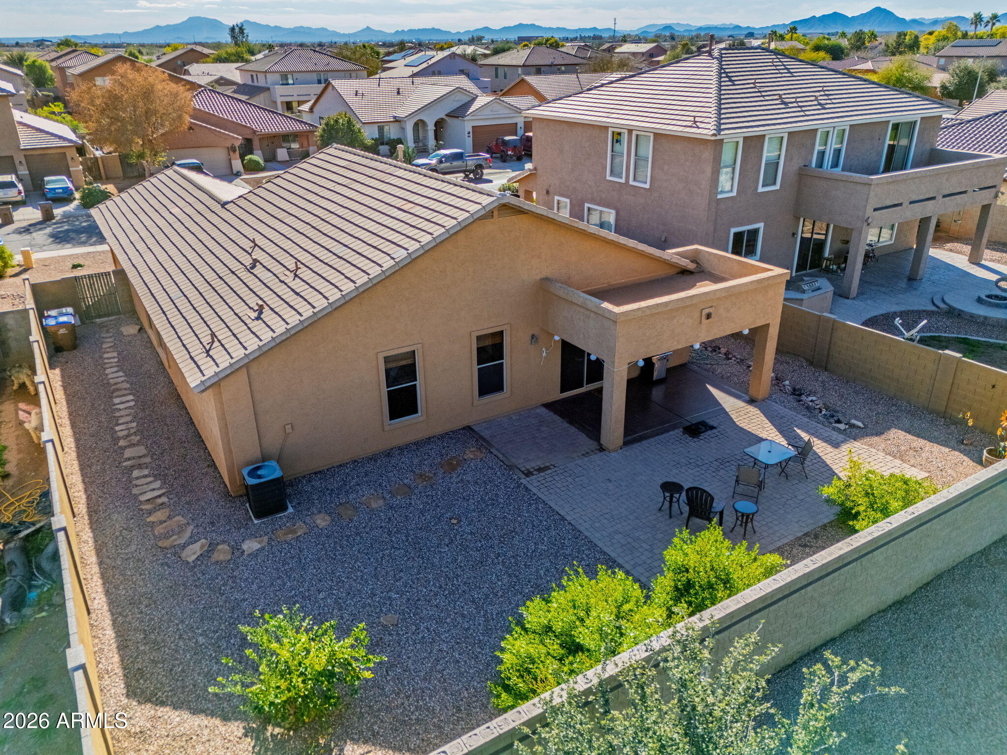45558 West Mountain View Road Maricopa, AZ 85139 - Photo 30 of 33 an aerial view of a house with garden space and street view