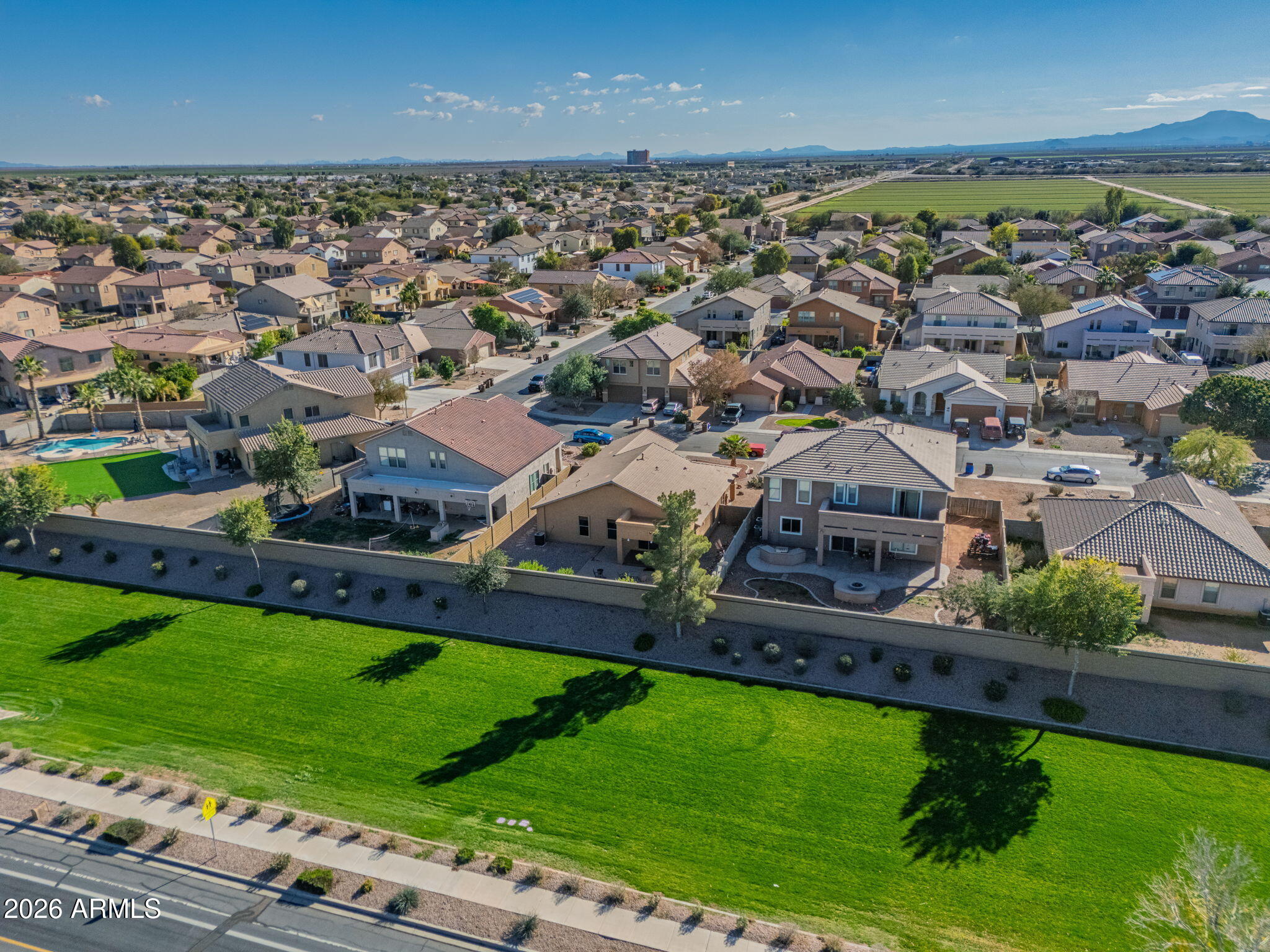 45558 West Mountain View Road Maricopa, AZ 85139 - Photo 31 of 33 an aerial view of residential houses with outdoor space