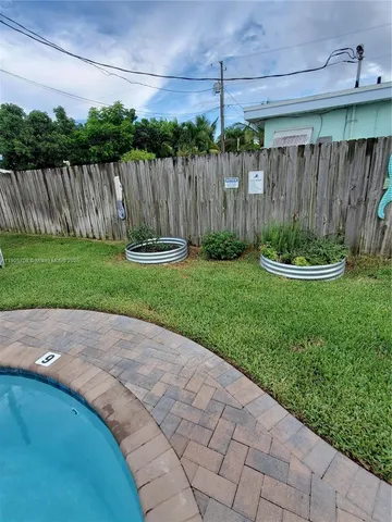 a view of a backyard with a garden