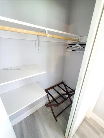 a view of a room with rack on the wall