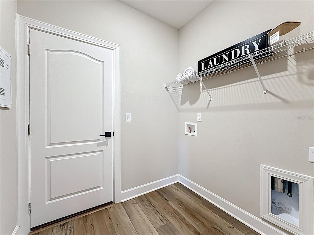 3941 Gareys Ferry Way Middleburg, FL 32068 - Photo 29 of 45 a view of a storage & utility room with closet
