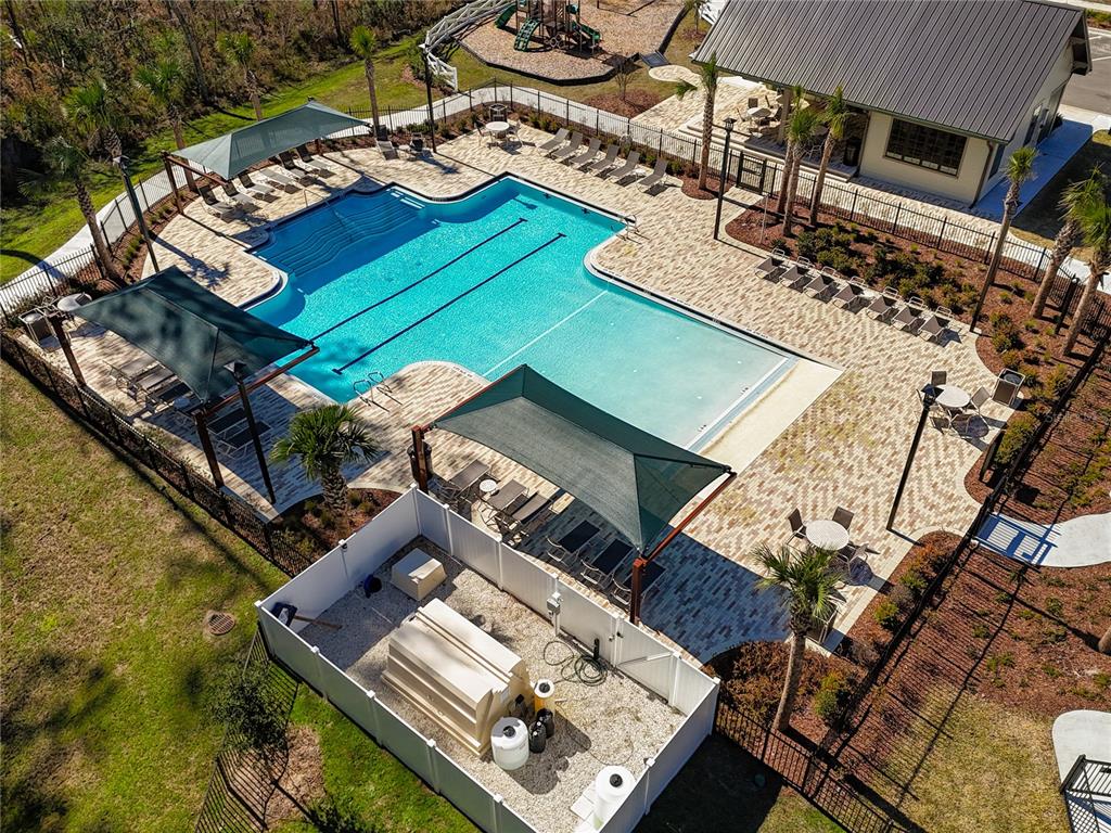 3941 Gareys Ferry Way Middleburg, FL 32068 - Photo 40 of 45 a view of a house with pool and chairs