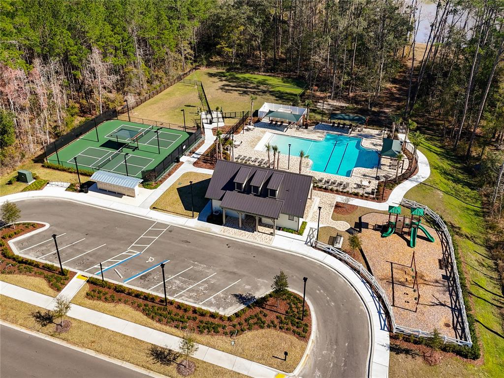3941 Gareys Ferry Way Middleburg, FL 32068 - Photo 41 of 45 a view of a swimming pool with a patio
