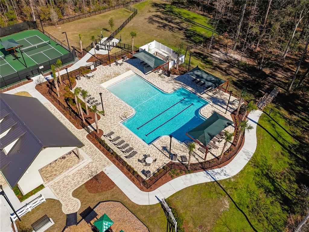 3941 Gareys Ferry Way Middleburg, FL 32068 - Photo 44 of 45 an aerial view of a house a yard patio swimming pool and outdoor seating