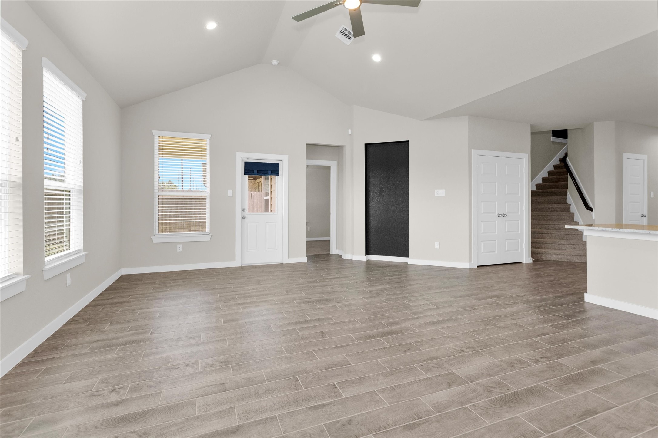 2210 Reed Cave Ln Spring Spring, TX 77386 - Photo 19 of 39 Living room with vaulted ceiling.