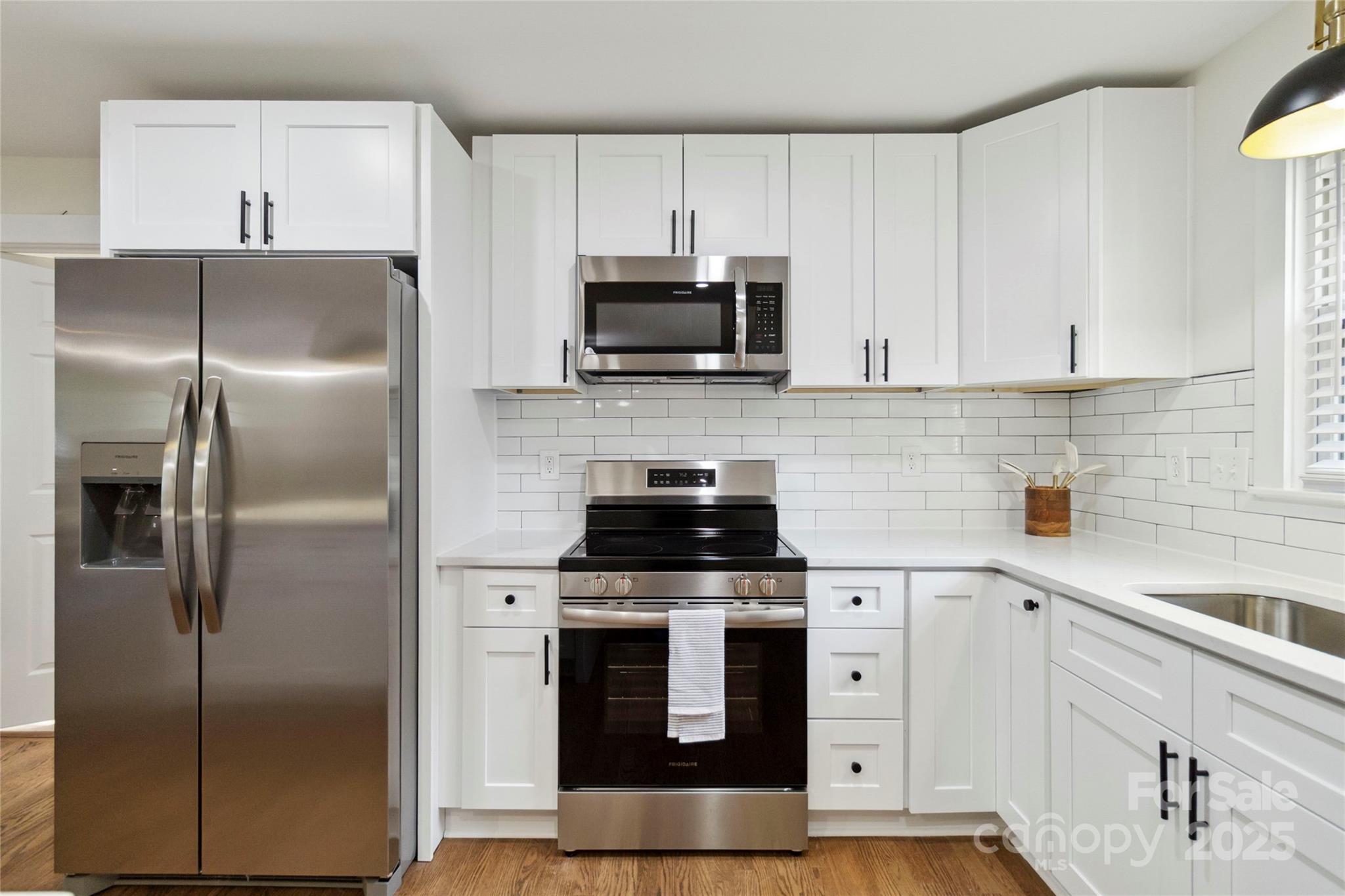 3801 Rea Road Charlotte, NC 28226 - Photo 15 of 47 a kitchen with cabinets stainless steel appliances and a sink
