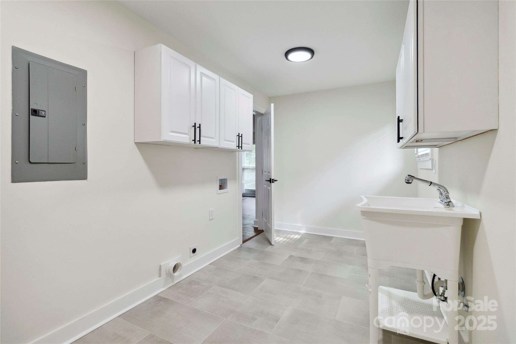 3801 Rea Road Charlotte, NC 28226 - Photo 22 of 47 a view of a kitchen with sink and refrigerator