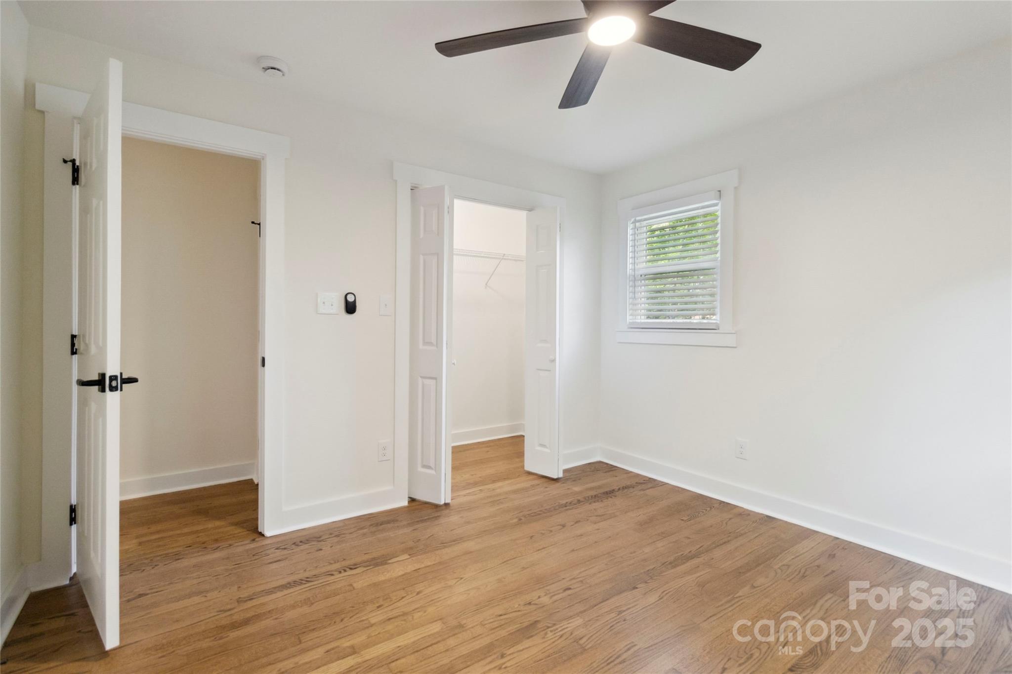3801 Rea Road Charlotte, NC 28226 - Photo 29 of 47 a view of an empty room with wooden floor and a window