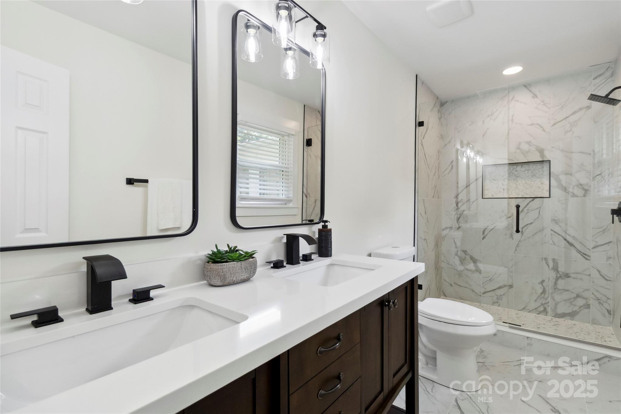 3801 Rea Road Charlotte, NC 28226 - Photo 35 of 47 a bathroom with a granite countertop sink a toilet and shower