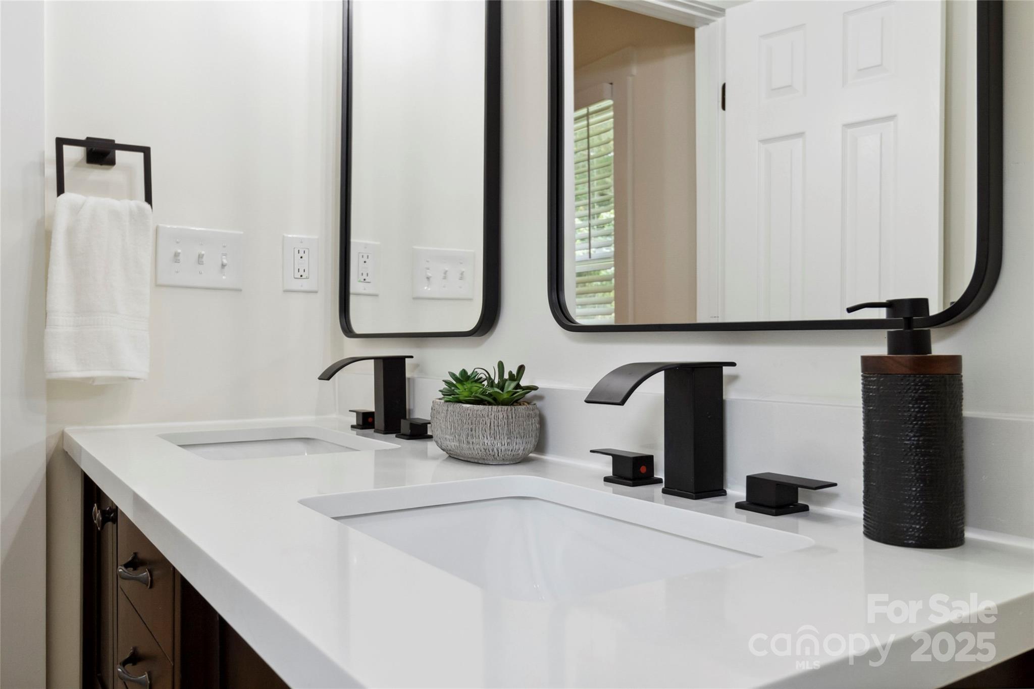3801 Rea Road Charlotte, NC 28226 - Photo 39 of 47 a kitchen with a sink and a mirror