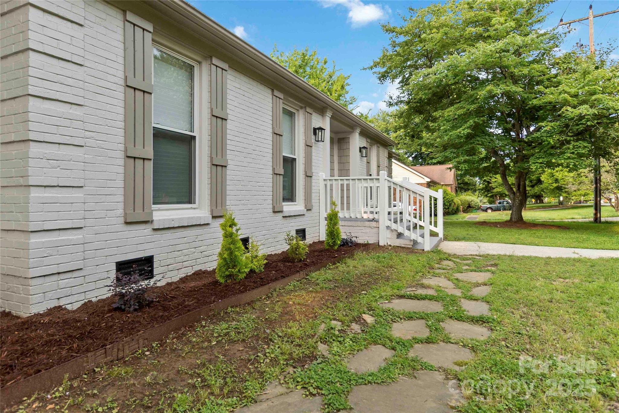 3801 Rea Road Charlotte, NC 28226 - Photo 4 of 47 a view of a house with a yard