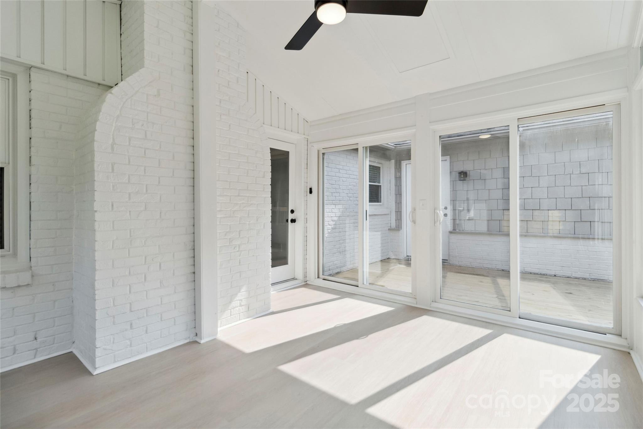 3801 Rea Road Charlotte, NC 28226 - Photo 41 of 47 a spacious bedroom with a bed and glass door