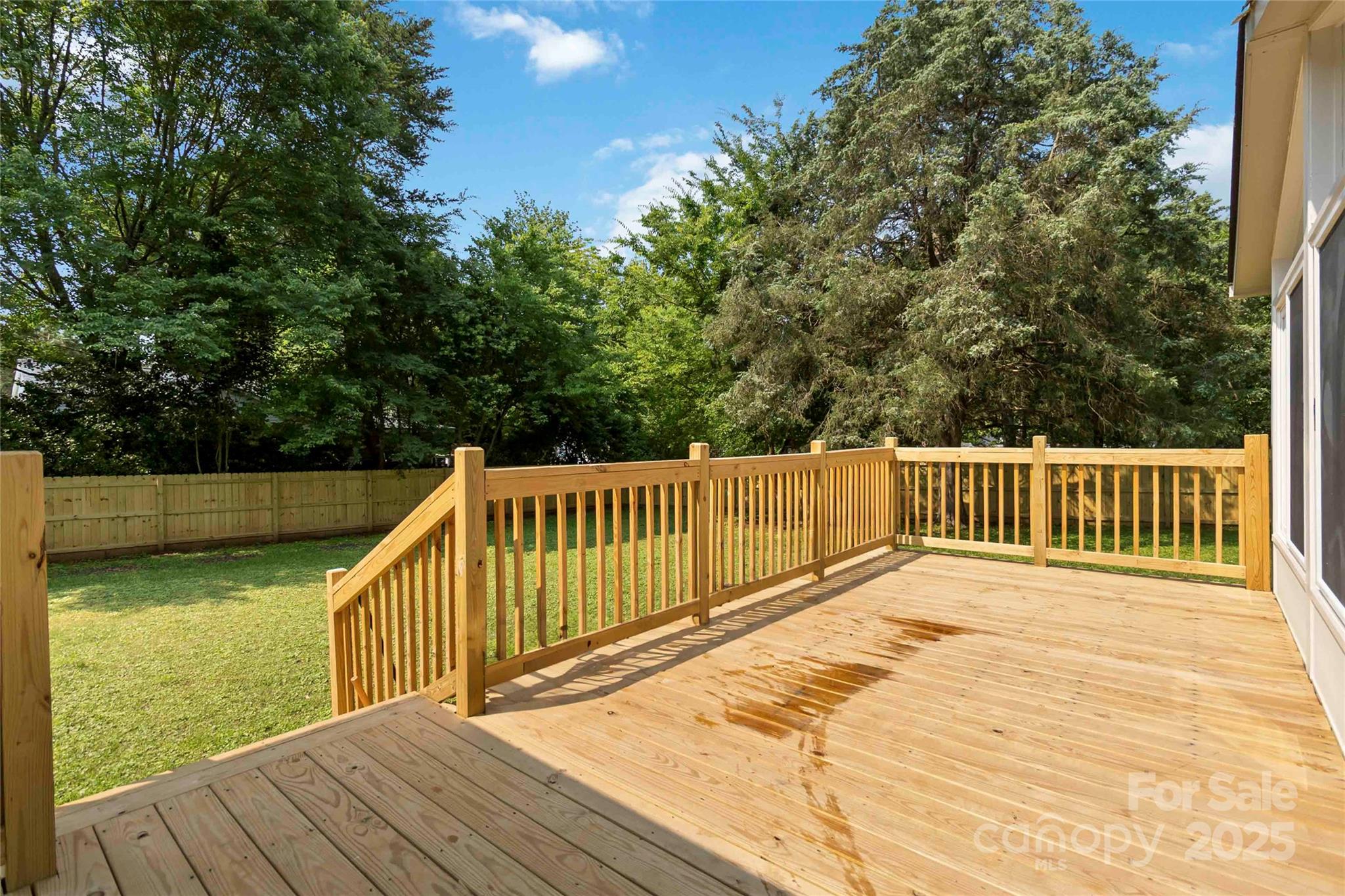 3801 Rea Road Charlotte, NC 28226 - Photo 44 of 47 a balcony with wooden floor and yard in the back