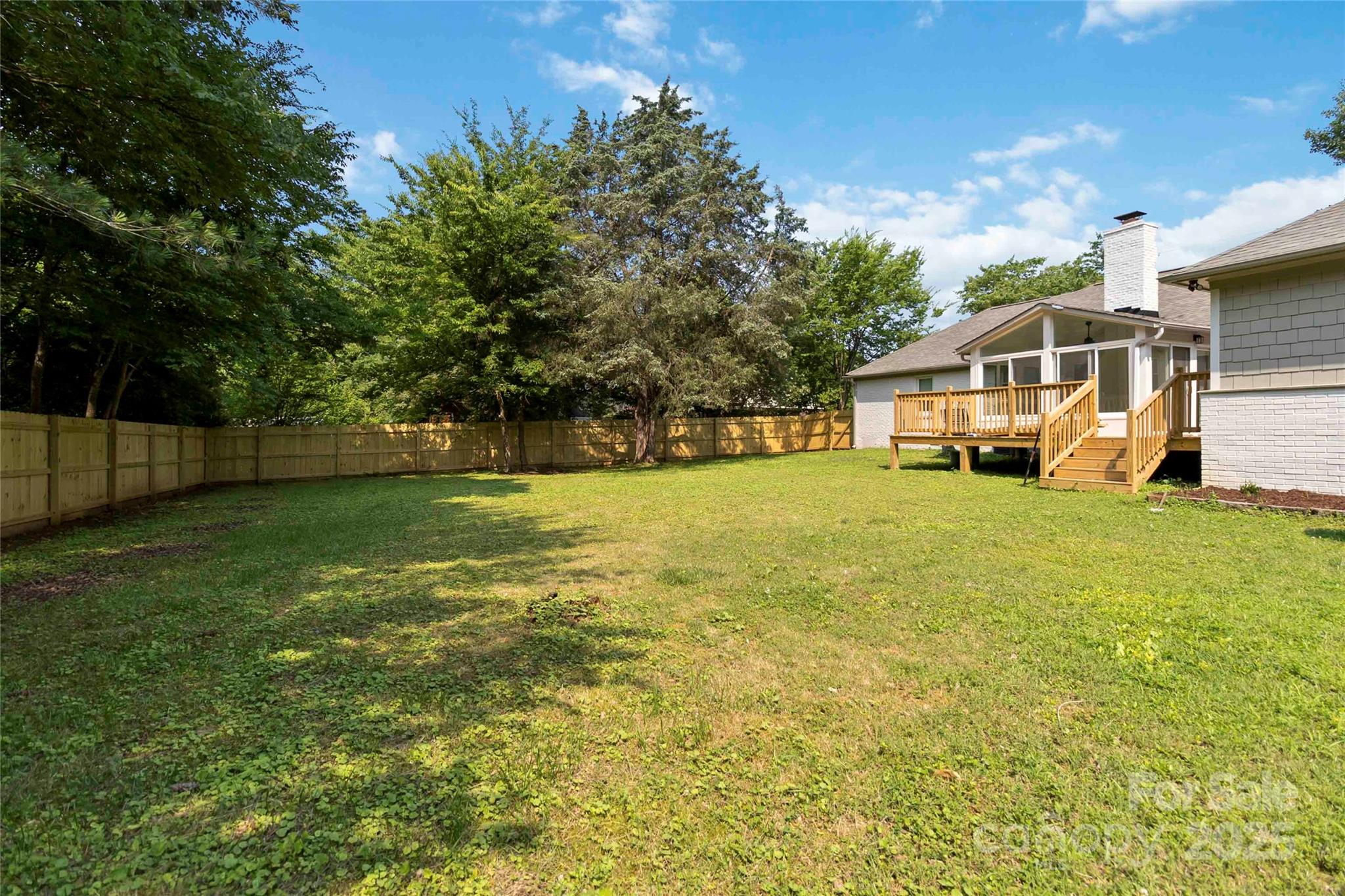 3801 Rea Road Charlotte, NC 28226 - Photo 45 of 47 a view of a house with a big yard and large trees