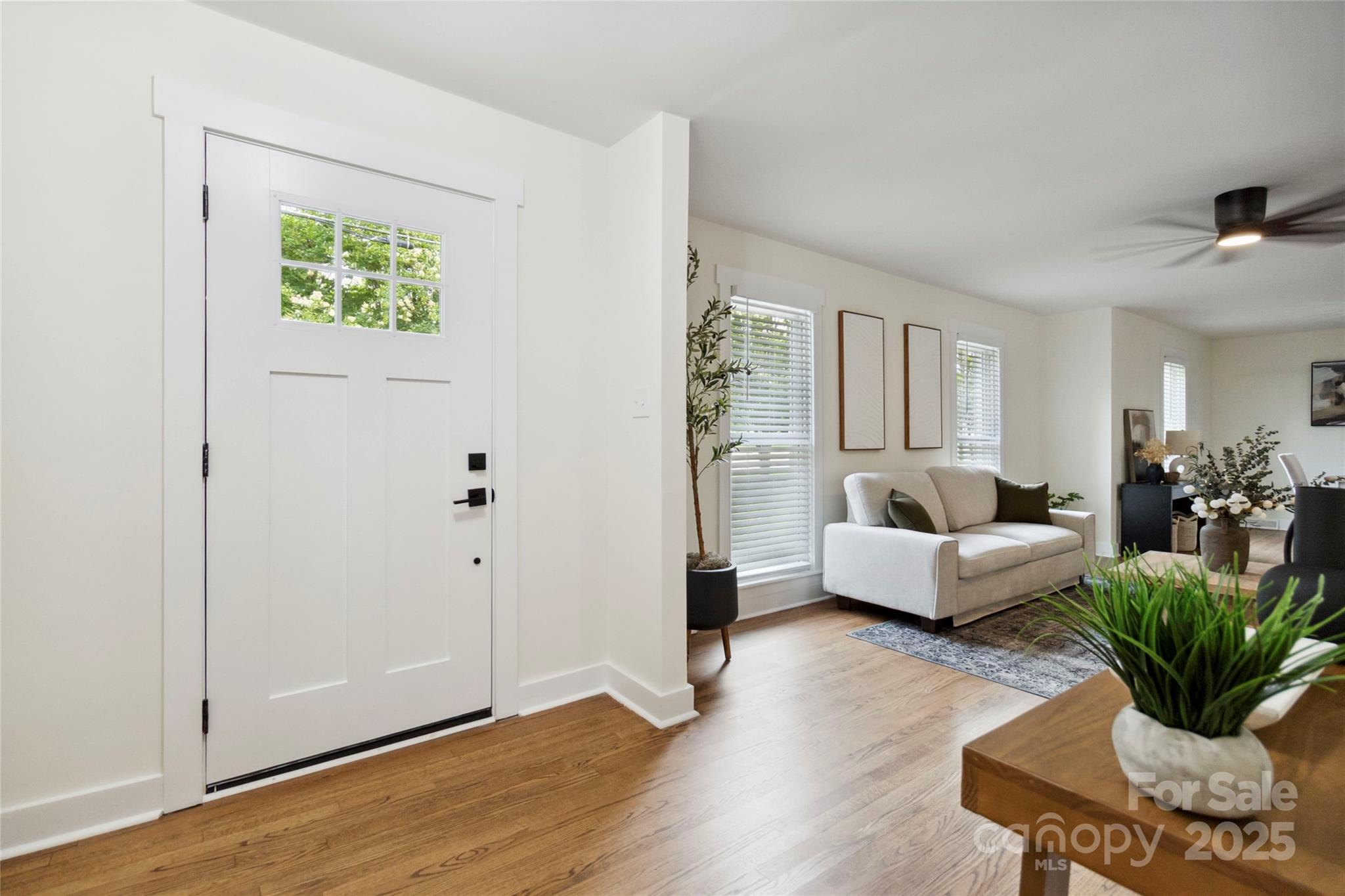3801 Rea Road Charlotte, NC 28226 - Photo 7 of 47 a living room with furniture potted plant and a window