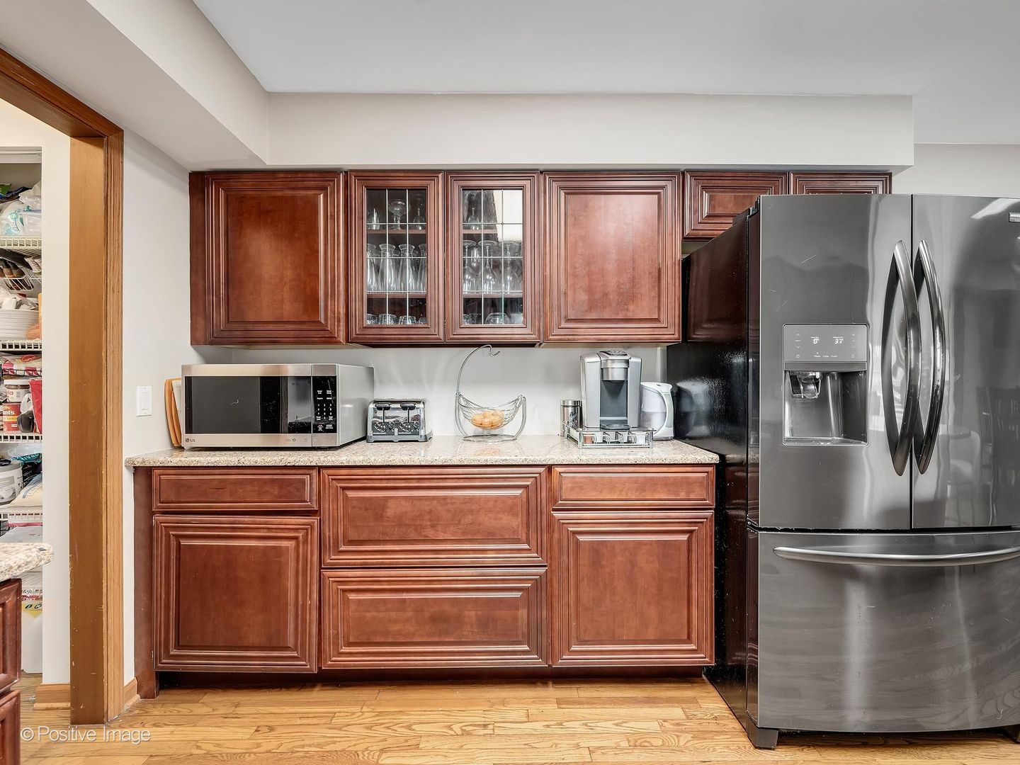 612 Stuart Drive Carol Stream, IL 60188 - Photo 12 of 29 a kitchen with stainless steel appliances granite countertop a refrigerator a stove a sink and a cabinets