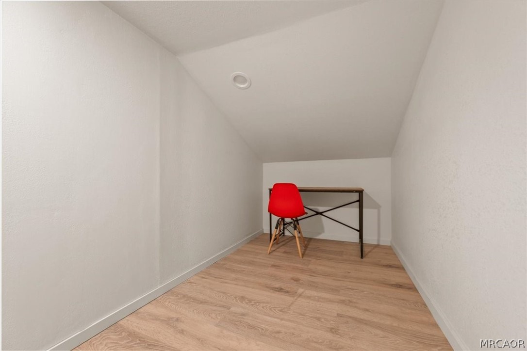760 Blue Jay Road, Unit 26 Big Bear Lake, CA 92315 - Photo 22 of 35 a room with a table and a chair