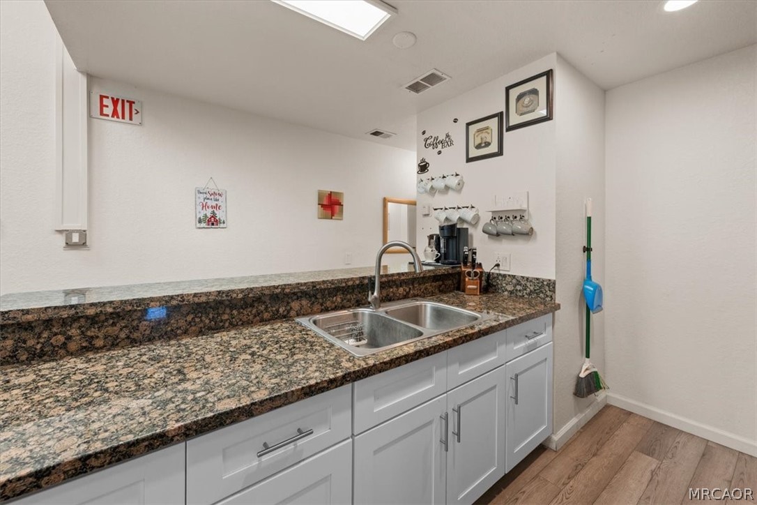 760 Blue Jay Road, Unit 26 Big Bear Lake, CA 92315 - Photo 10 of 35 a kitchen with sink and cabinets