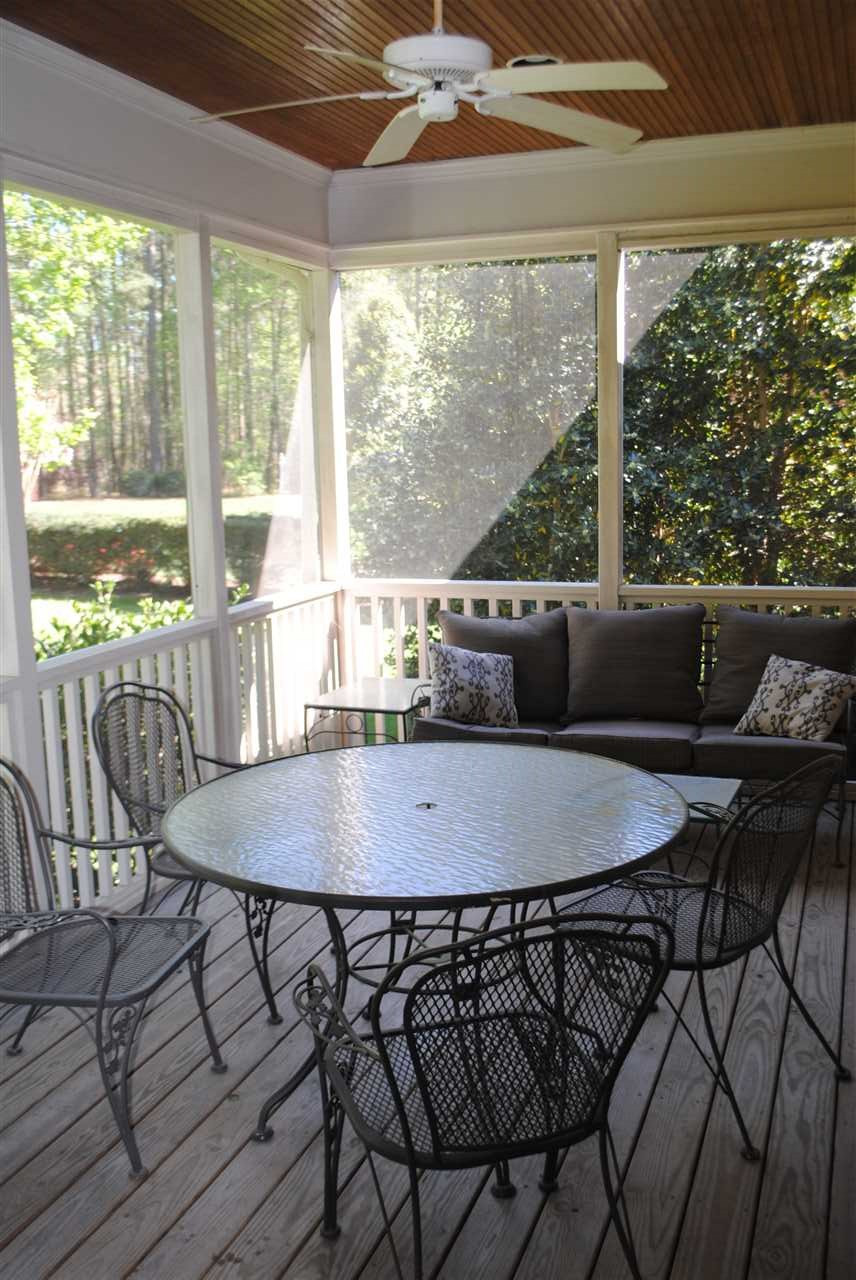 7032 Trenton Ridge Court Raleigh, NC 27613 - Photo 14 of 25 Quiet Private and Very Comfortable Screened Porch.