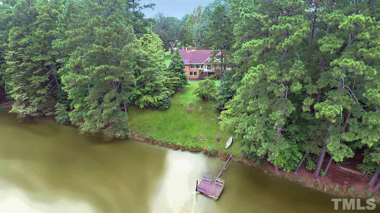 15109 Possum Track Road Raleigh, NC 27614 - Photo 8 of 27 an aerial view of a house with a yard and lake view
