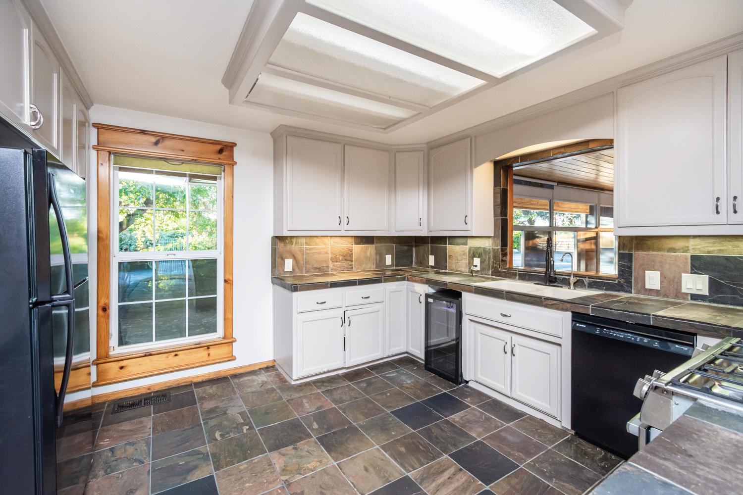 664 Perkins Road Arbuckle, CA 95912 - Photo 18 of 91 a kitchen with a sink cabinets and window