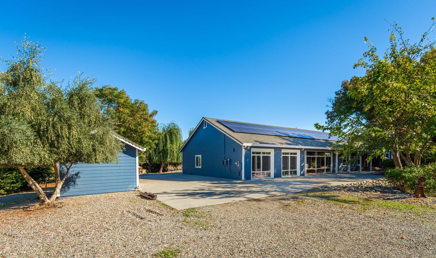 664 Perkins Road Arbuckle, CA 95912 - Photo 2 of 91 a view of house with outdoor space and garden