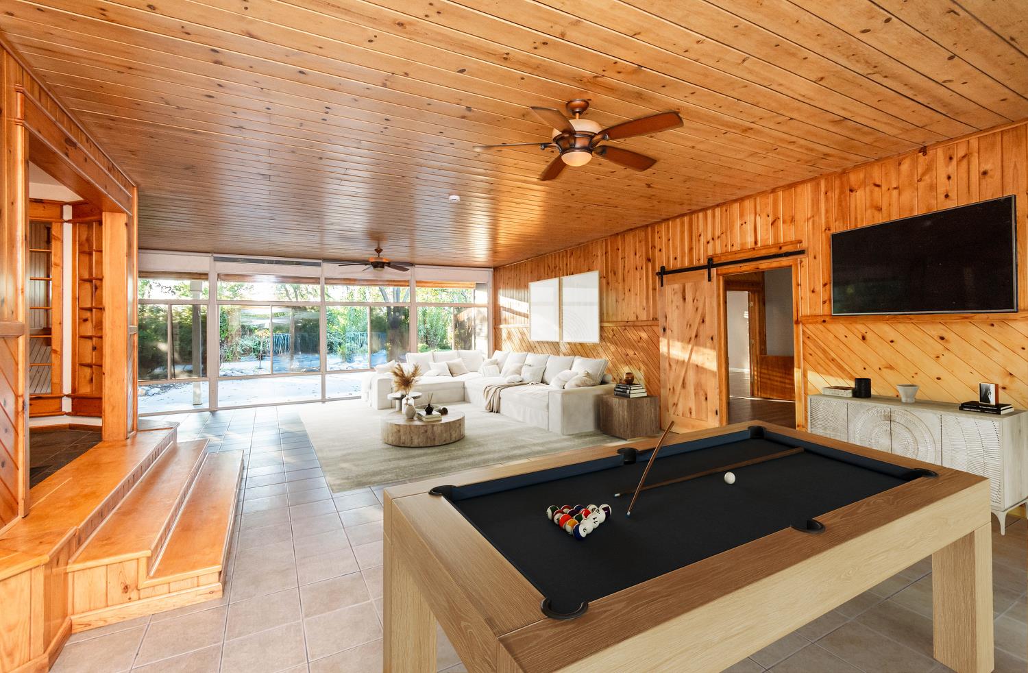 664 Perkins Road Arbuckle, CA 95912 - Photo 22 of 91 a living room with patio furniture and a flat screen tv