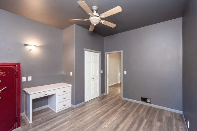 a view of a house with a yard and a garage