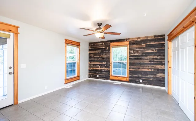 a view of a back yard with a slide