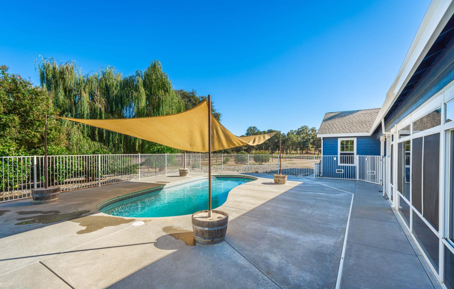 664 Perkins Road Arbuckle, CA 95912 - Photo 55 of 91 a view of a house with backyard and a slide