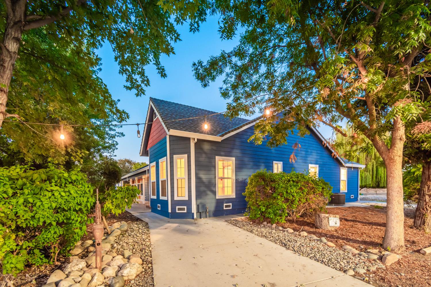 664 Perkins Road Arbuckle, CA 95912 - Photo 89 of 91 a view of a house with a tree beside it