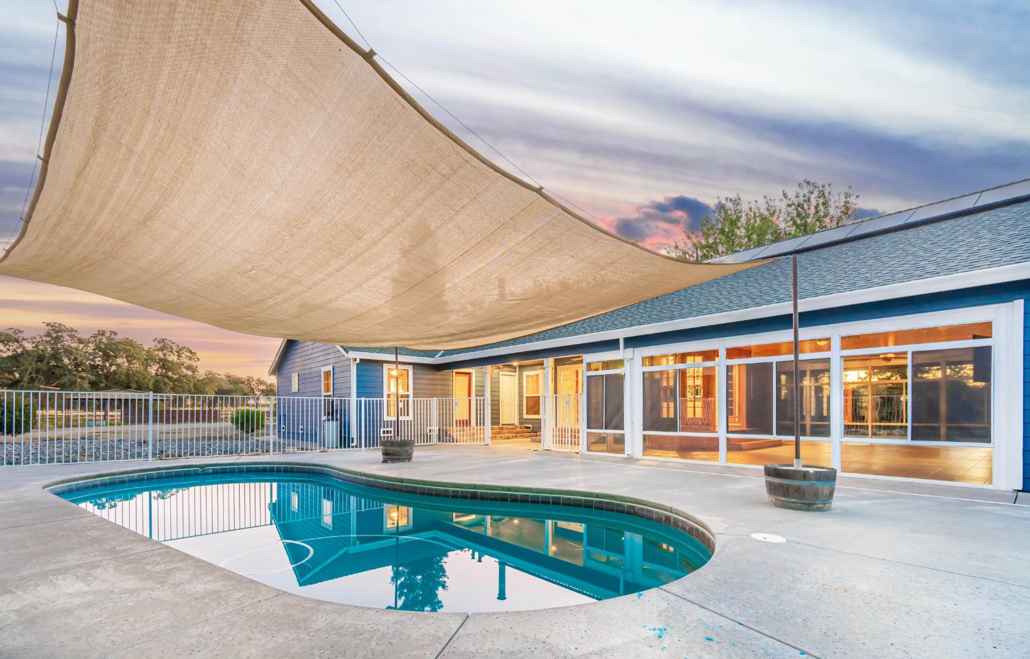 664 Perkins Road Arbuckle, CA 95912 - Photo 90 of 91 a view of a swimming pool with a patio