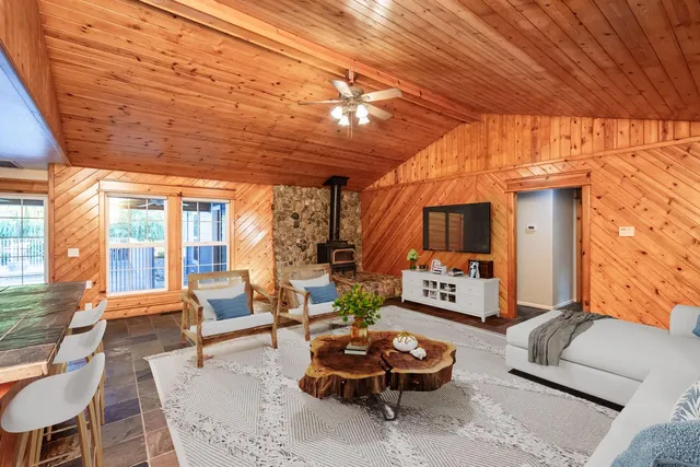 a kitchen with a sink cabinets and window
