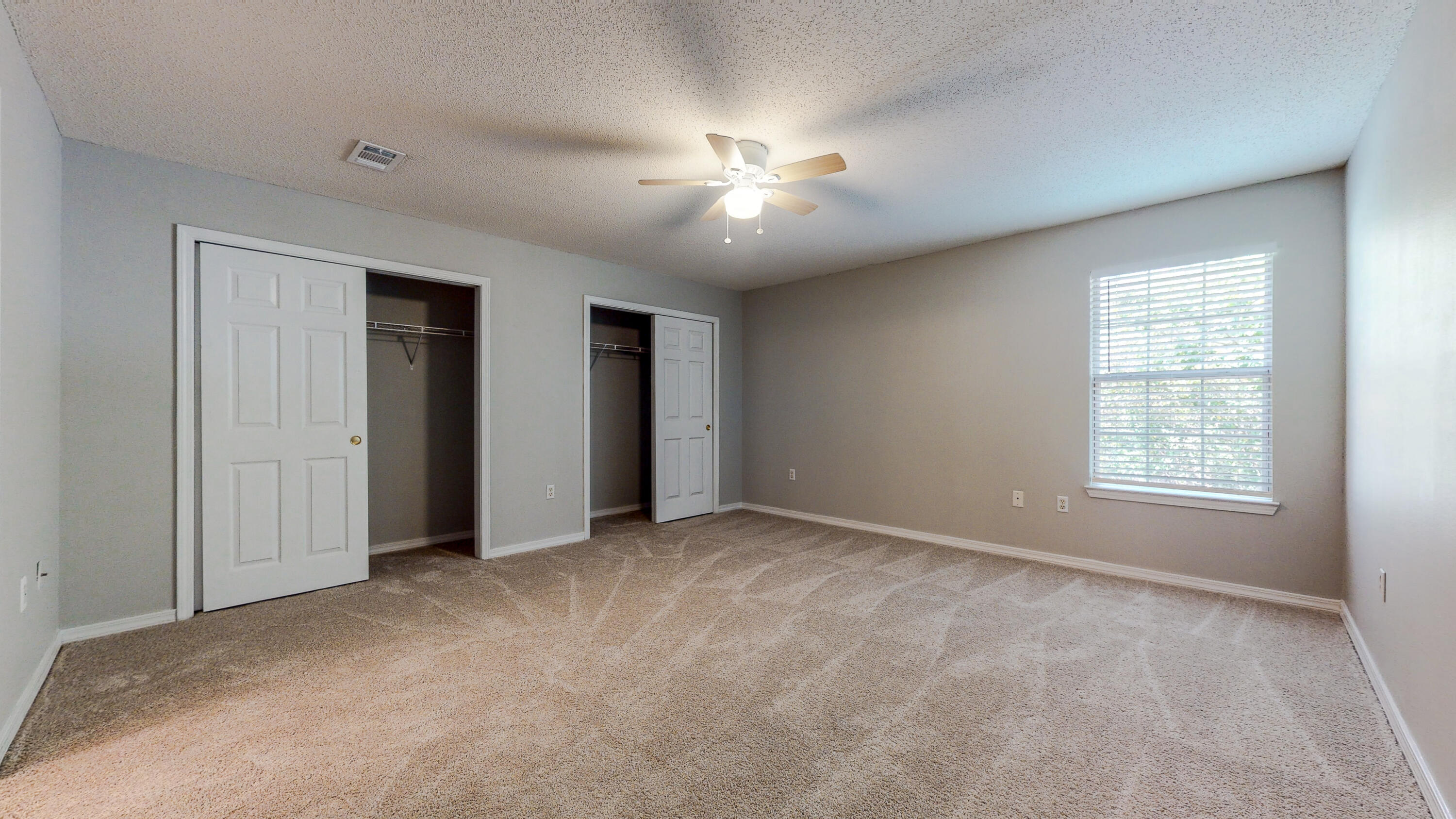 472 Keystone Road Mary Esther, FL 32569 - Photo 15 of 26 an empty room with closet and a ceiling fan