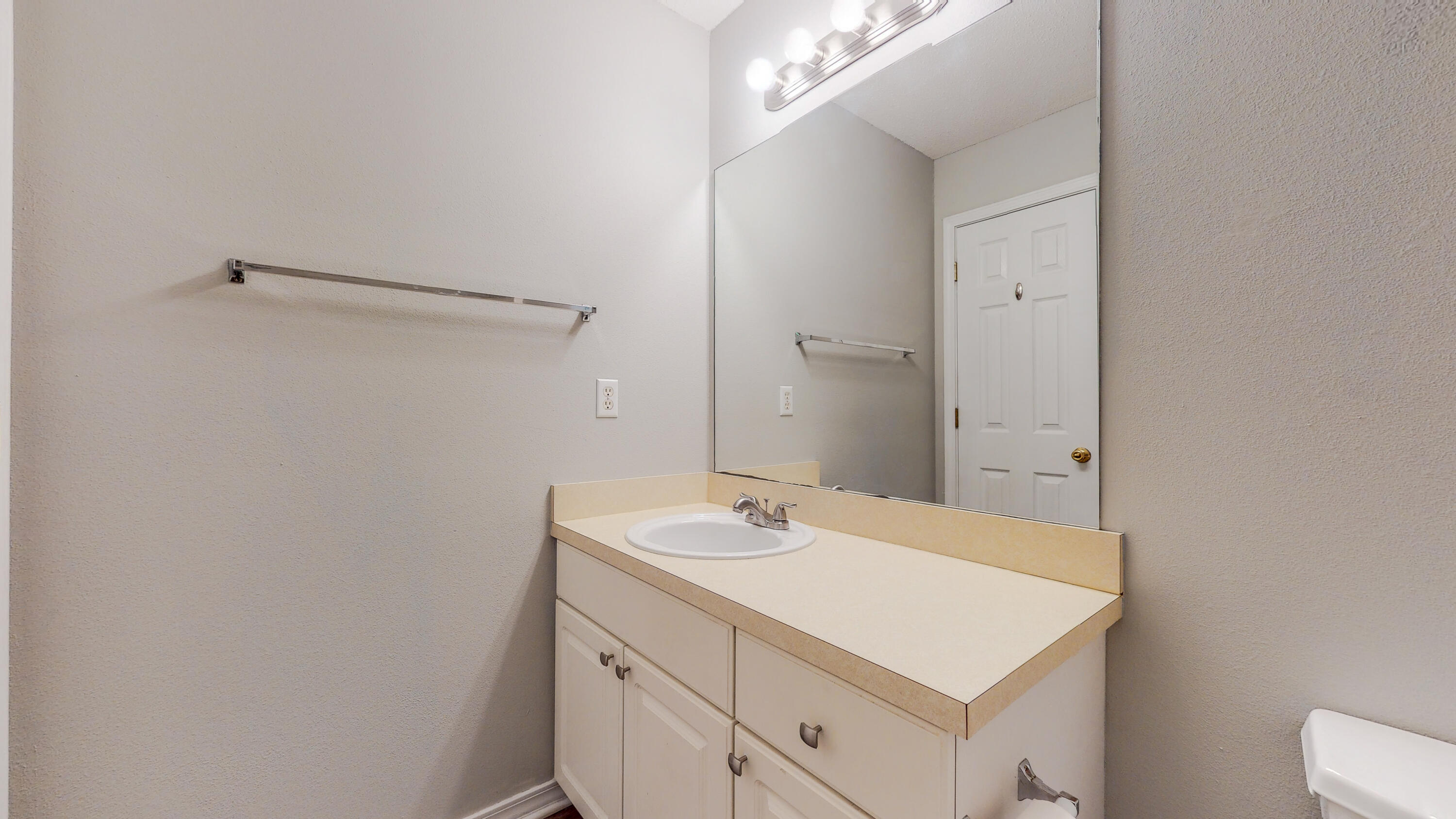 472 Keystone Road Mary Esther, FL 32569 - Photo 16 of 26 a bathroom with a sink vanity and a mirror