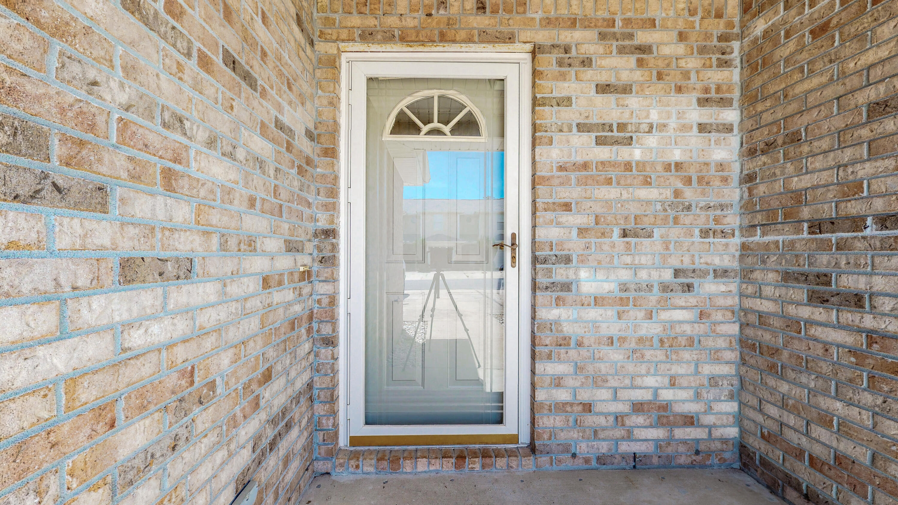 472 Keystone Road Mary Esther, FL 32569 - Photo 20 of 26 a view of a brick wall with glass door