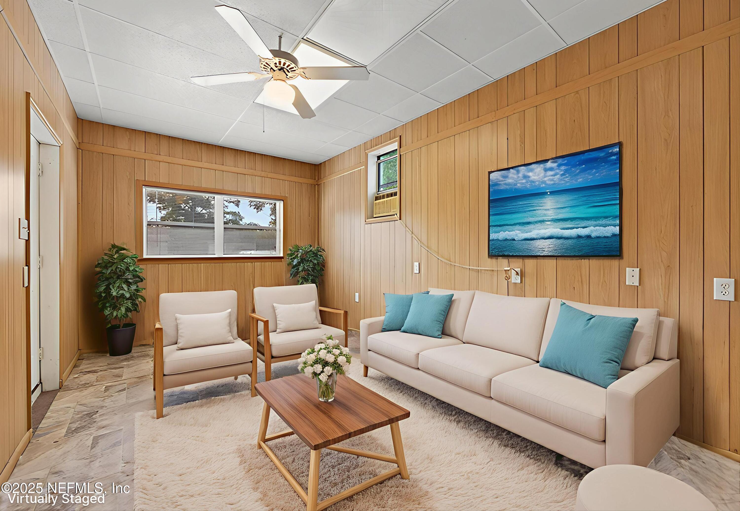 2630 Bywood Road Jacksonville, FL 32211 - Photo 17 of 35 a living room with furniture and a large window