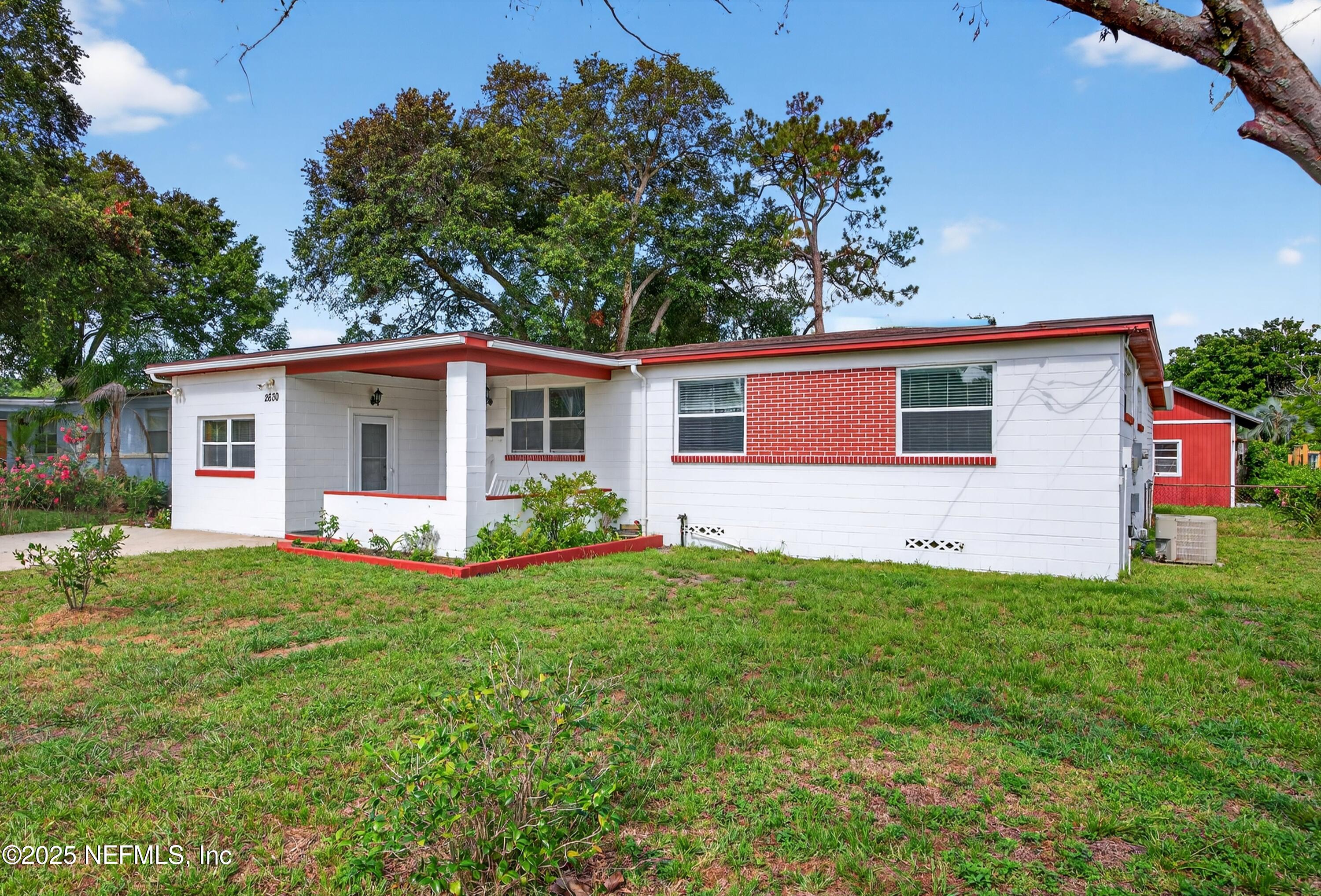 2630 Bywood Road Jacksonville, FL 32211 - Photo 2 of 35 a view of a house with a backyard