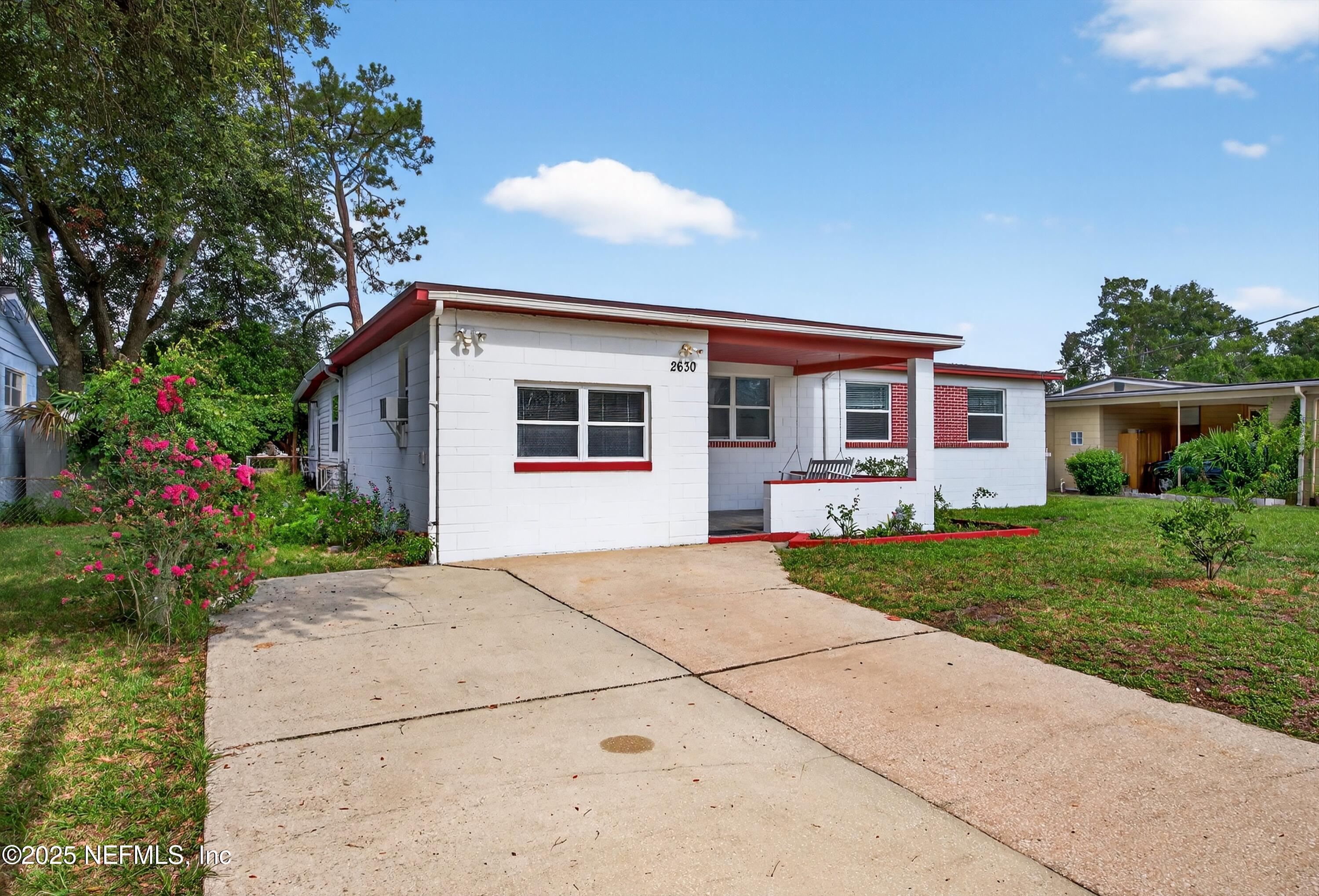 2630 Bywood Road Jacksonville, FL 32211 - Photo 3 of 35 front view of a house with a yard