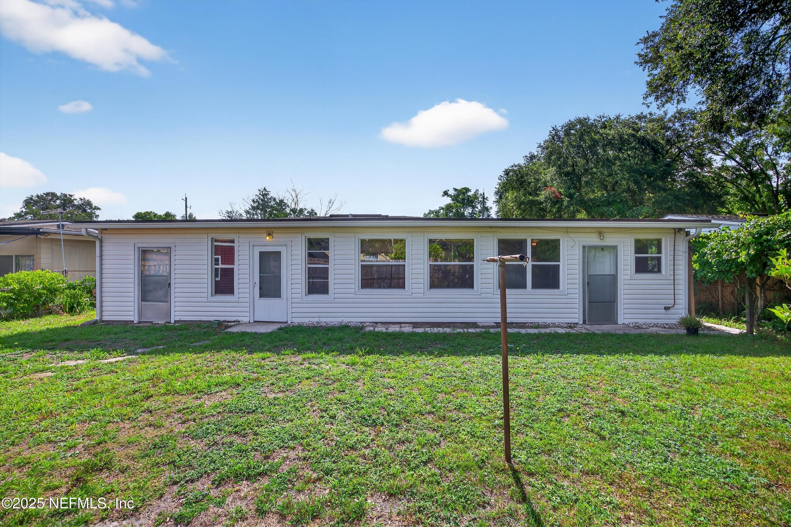 2630 Bywood Road Jacksonville, FL 32211 - Photo 33 of 35 a view of a house with a backyard