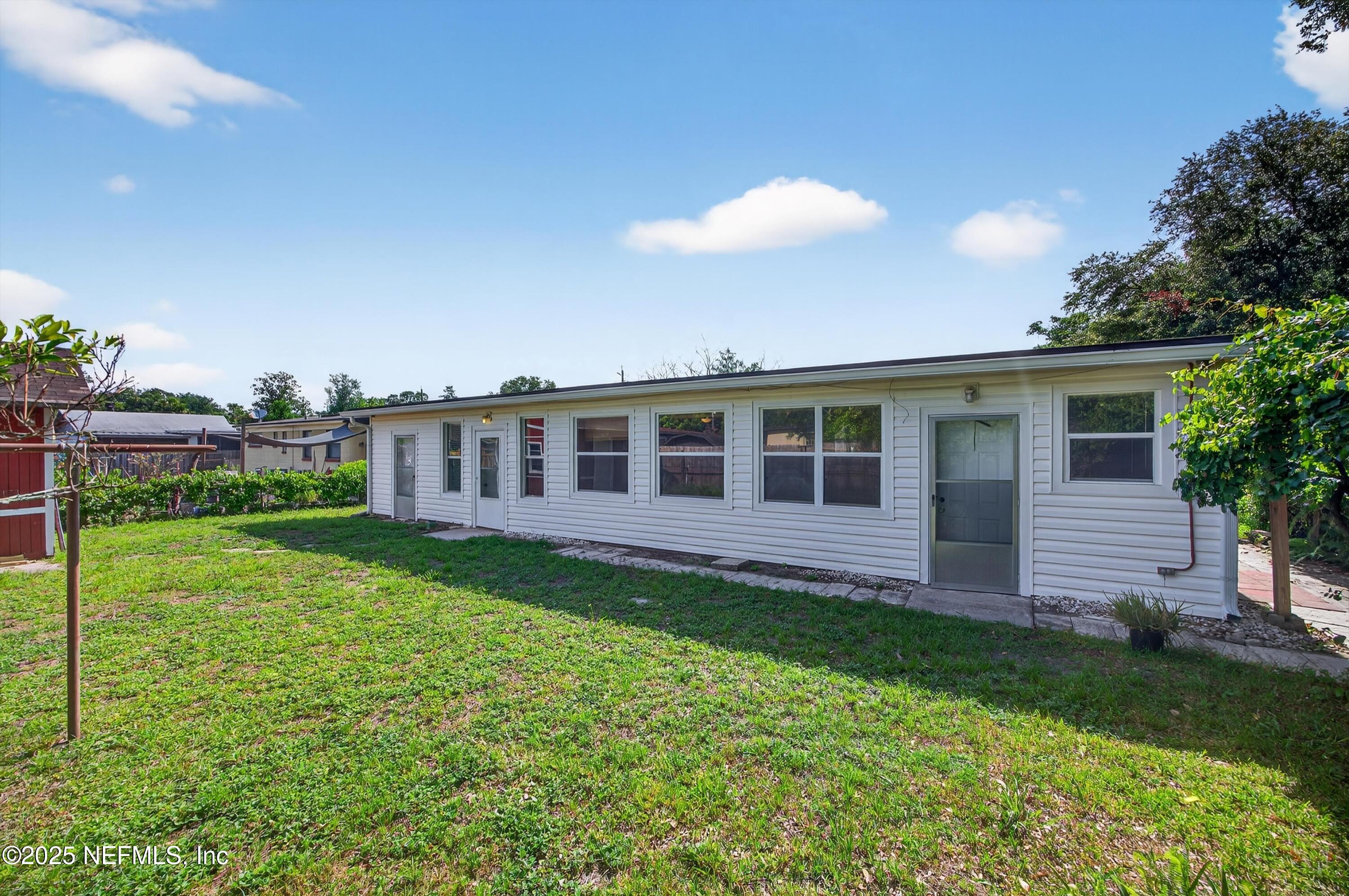 2630 Bywood Road Jacksonville, FL 32211 - Photo 34 of 35 a view of a house with backyard