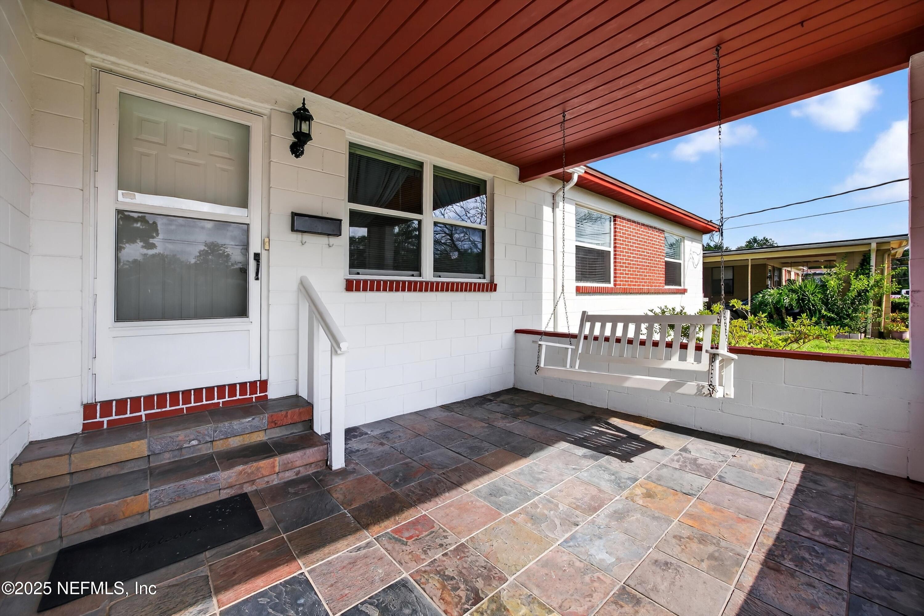 2630 Bywood Road Jacksonville, FL 32211 - Photo 4 of 35 a front view of a house with a yard