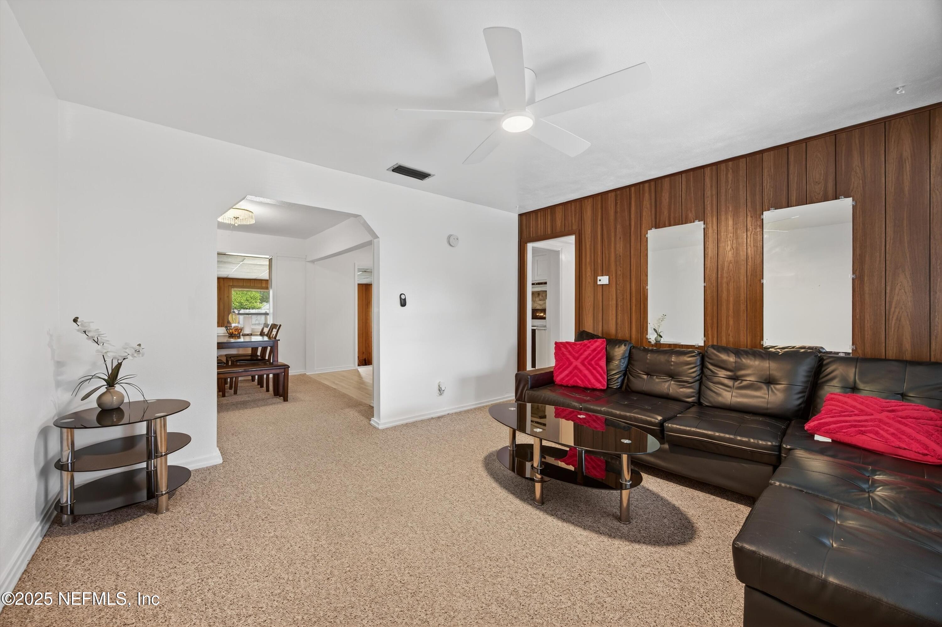 2630 Bywood Road Jacksonville, FL 32211 - Photo 6 of 35 a living room with furniture and wooden floor