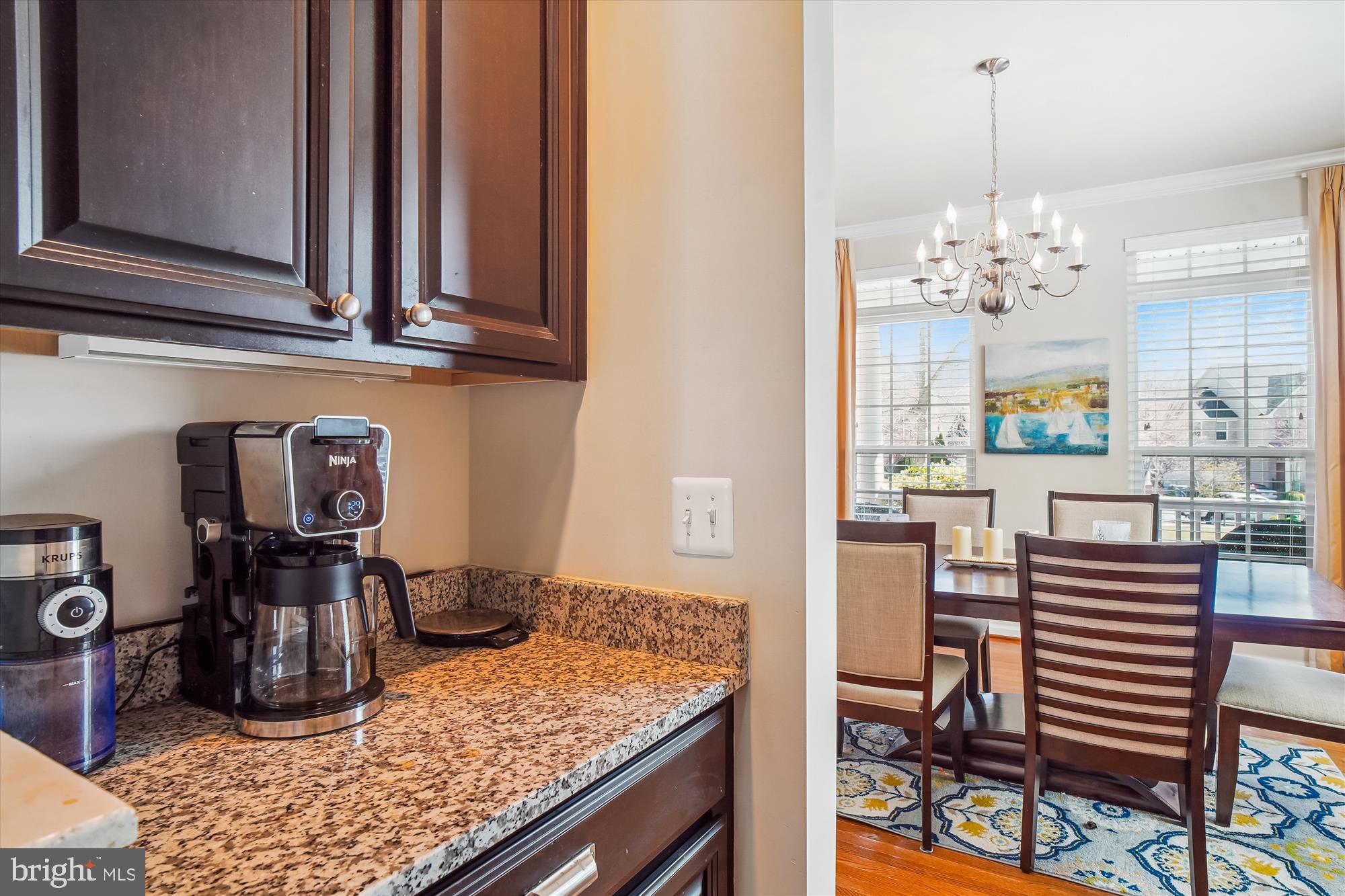 11903 Deer Spring Way Clarksburg, MD 20871 - Photo 14 of 88 a kitchen with a table and chairs in it