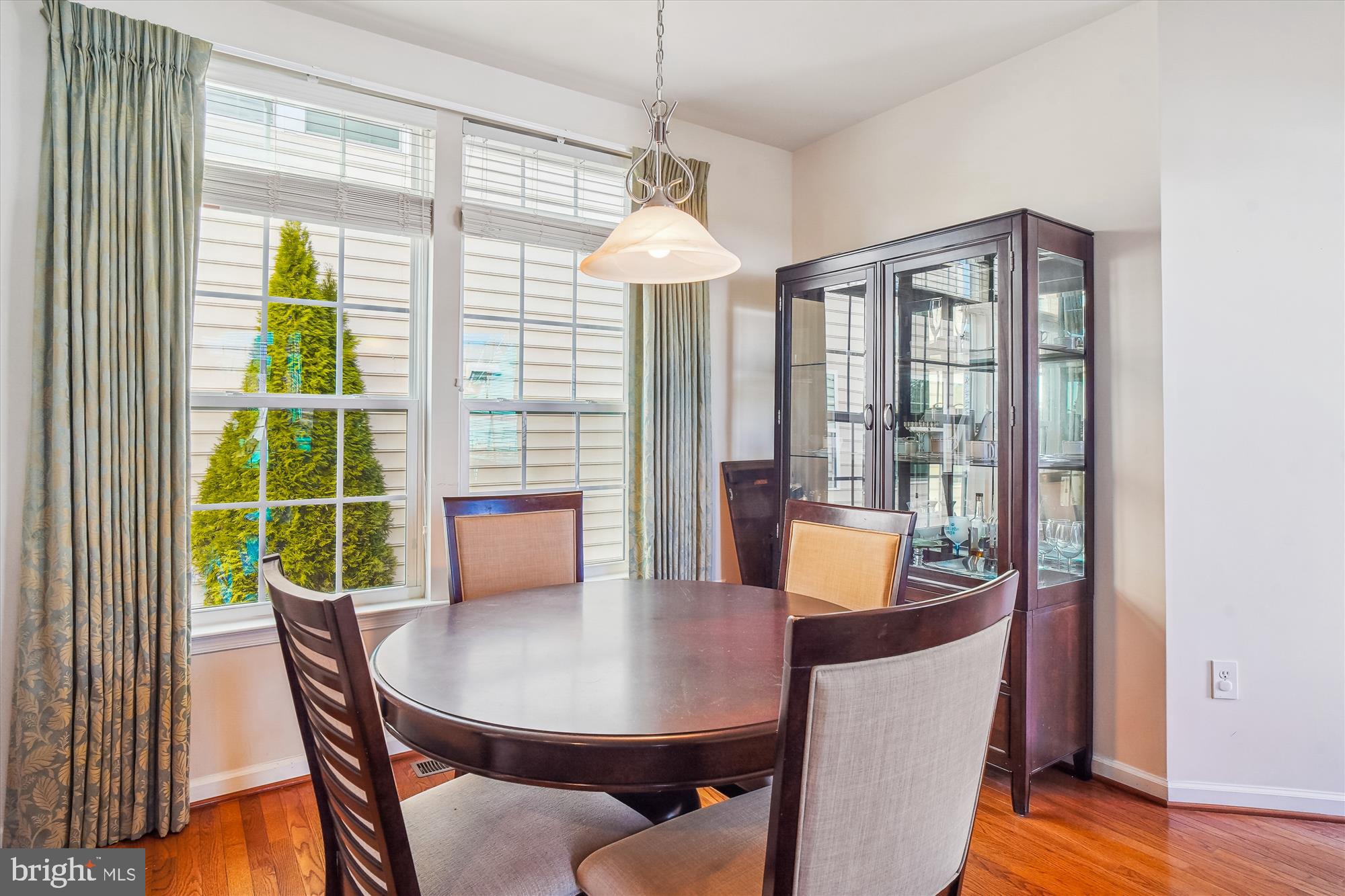 11903 Deer Spring Way Clarksburg, MD 20871 - Photo 20 of 88 a dining room with furniture window and wooden floor