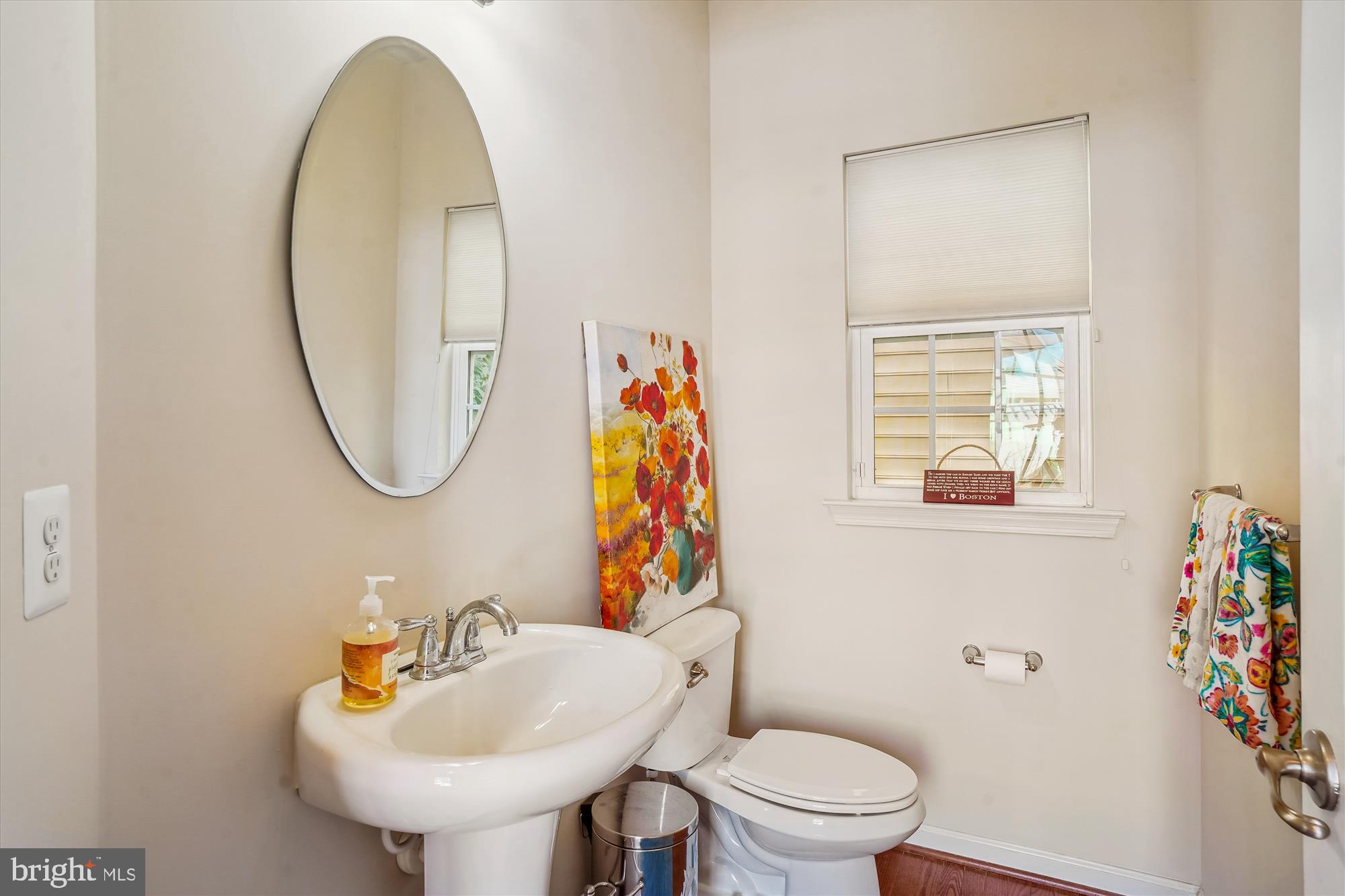 11903 Deer Spring Way Clarksburg, MD 20871 - Photo 24 of 88 a bathroom with a sink a mirror and a toilet