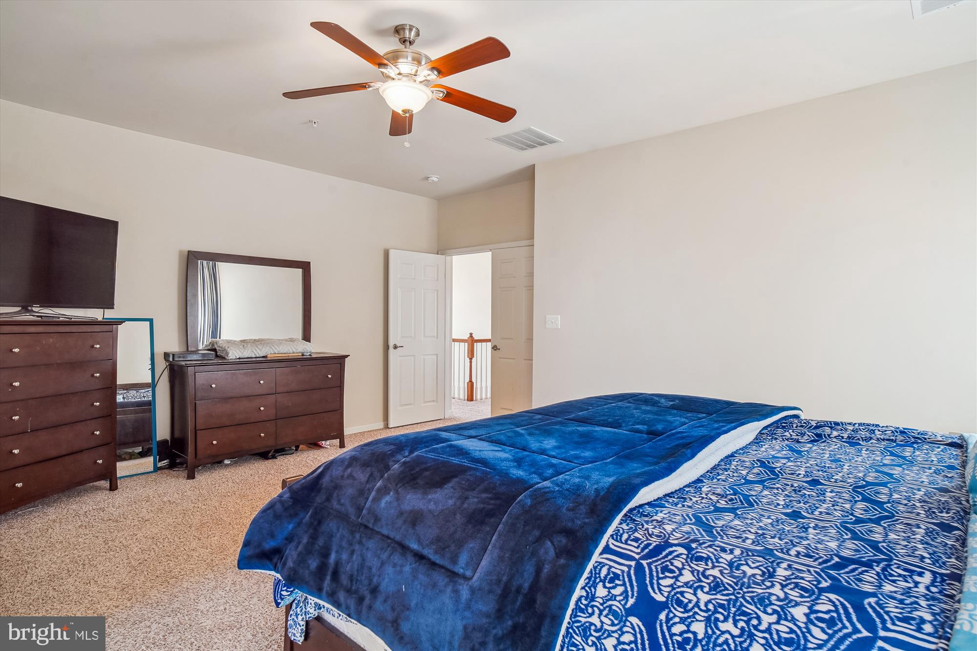 11903 Deer Spring Way Clarksburg, MD 20871 - Photo 28 of 88 a bedroom with a bed and a television