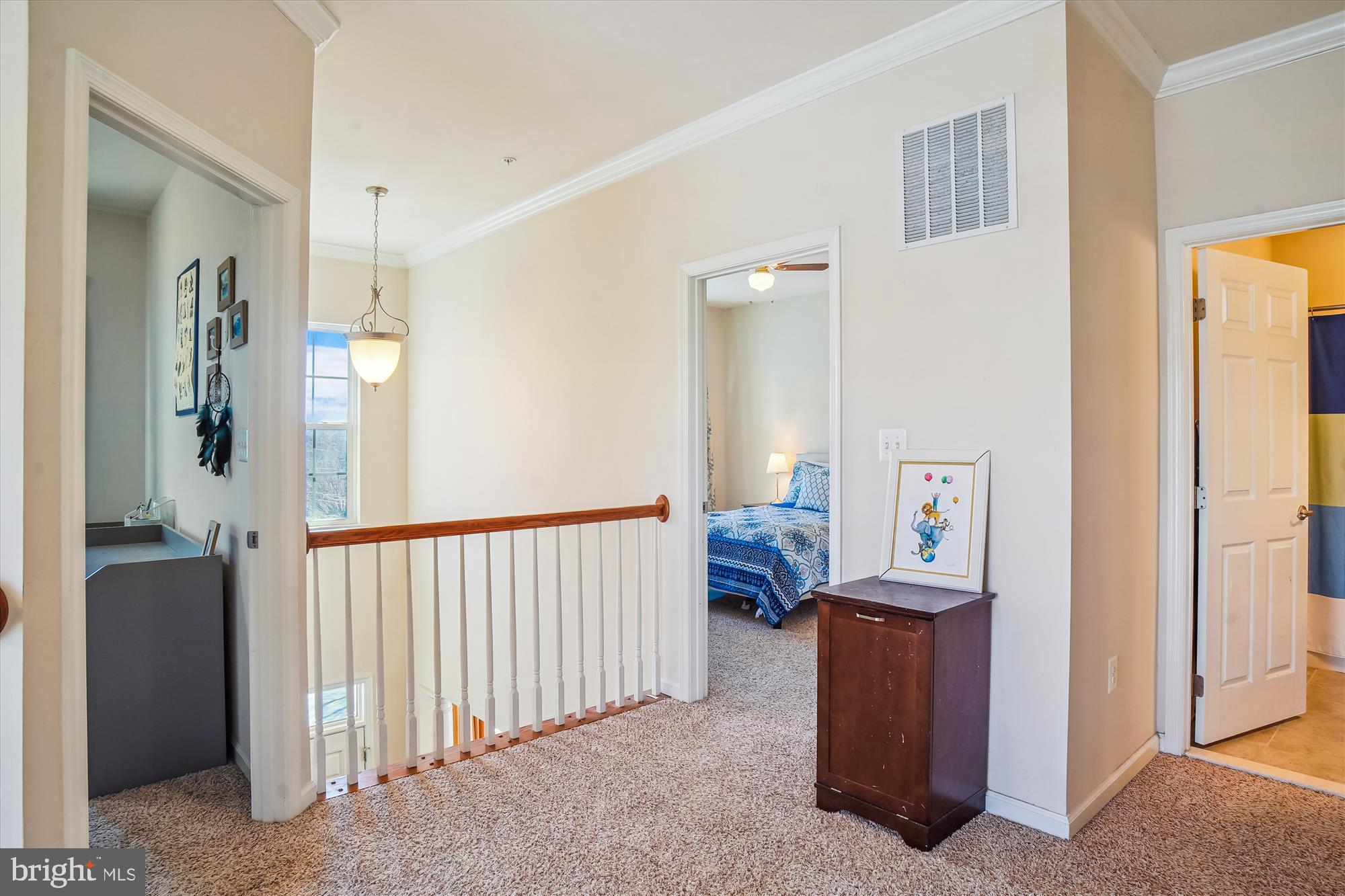 11903 Deer Spring Way Clarksburg, MD 20871 - Photo 34 of 88 a view of a hallway with a livingroom and entryway